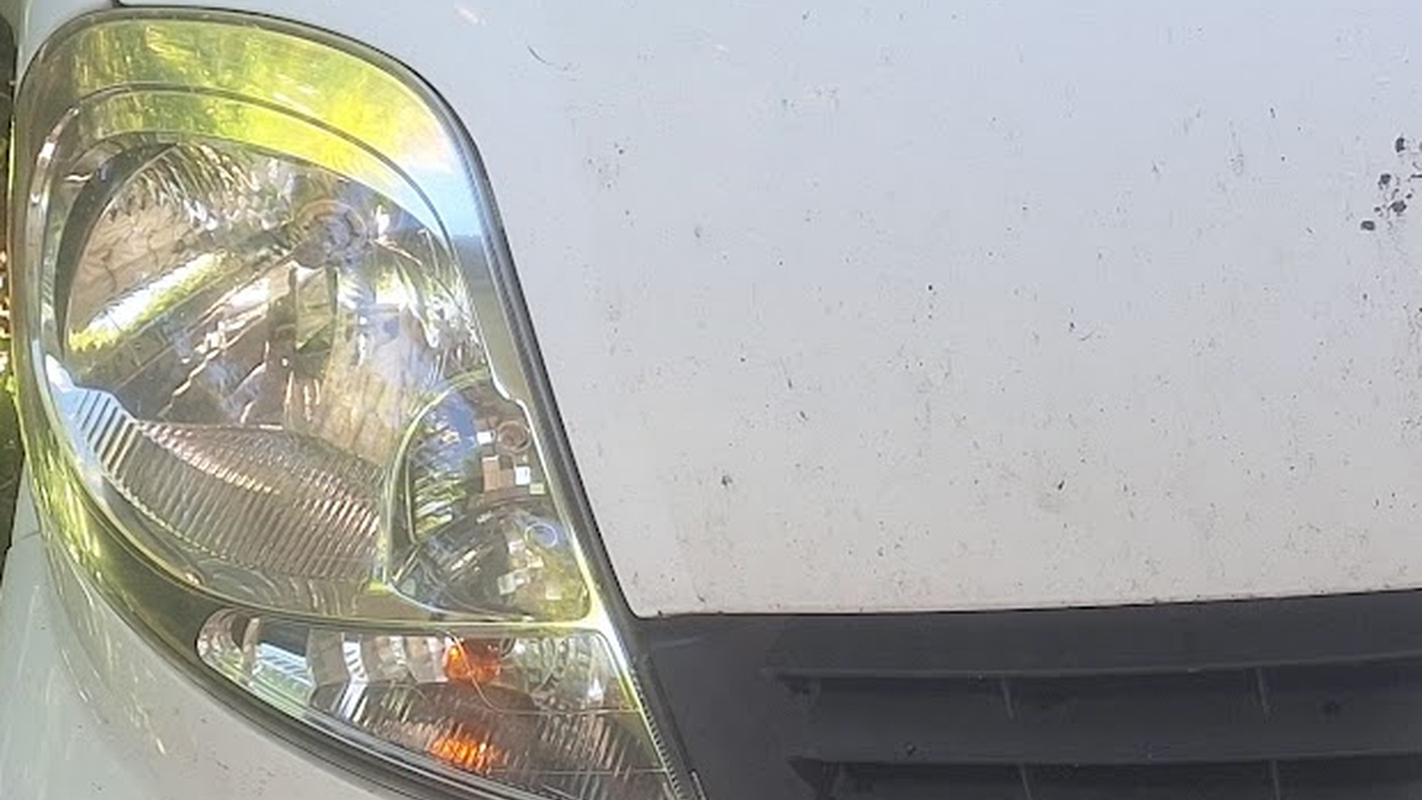 After mobile headlight restoration showing clearer car headlight lens