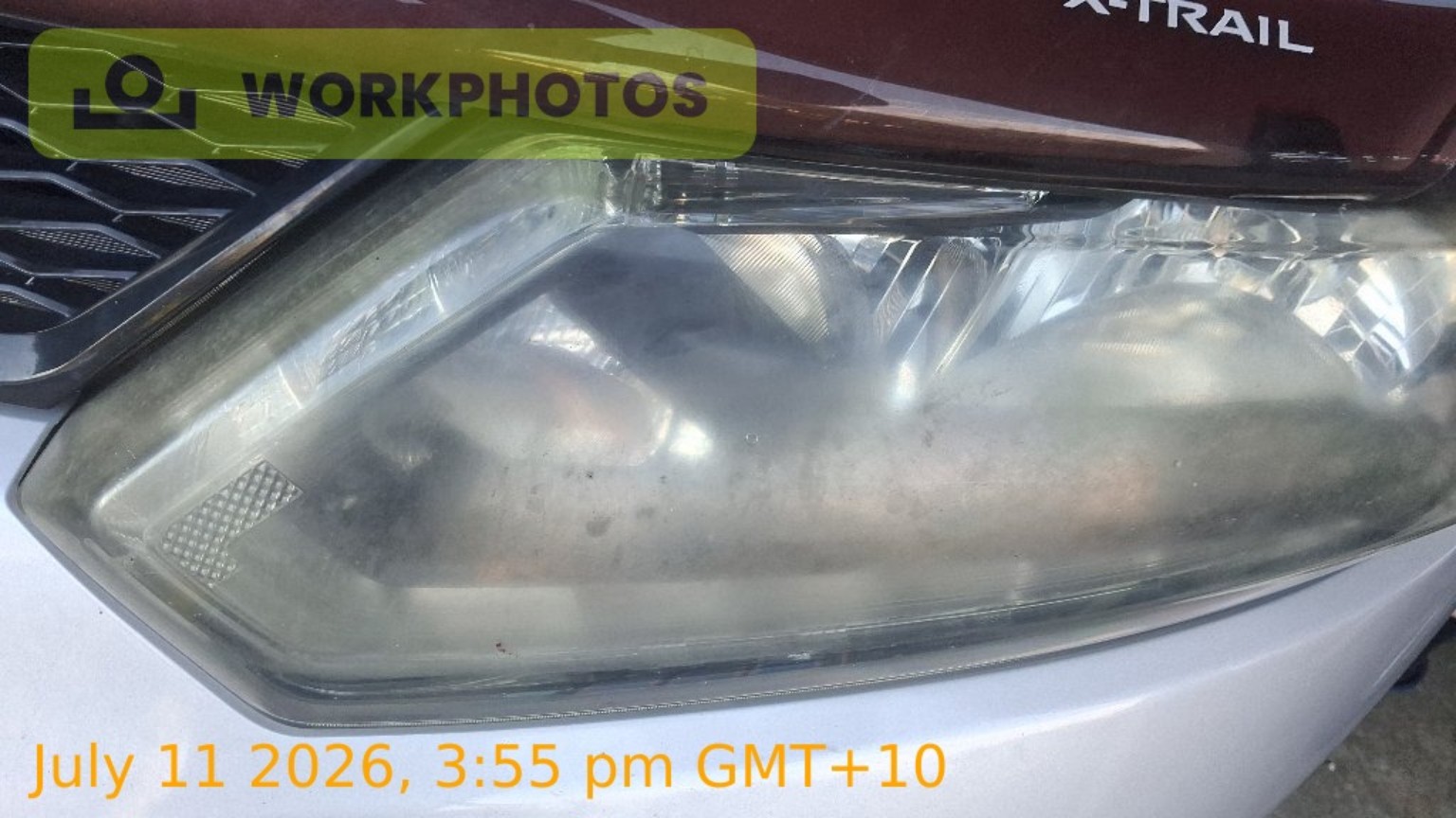 Before photo of cloudy Nissan X-Trail headlight before restoration with date stamp visible